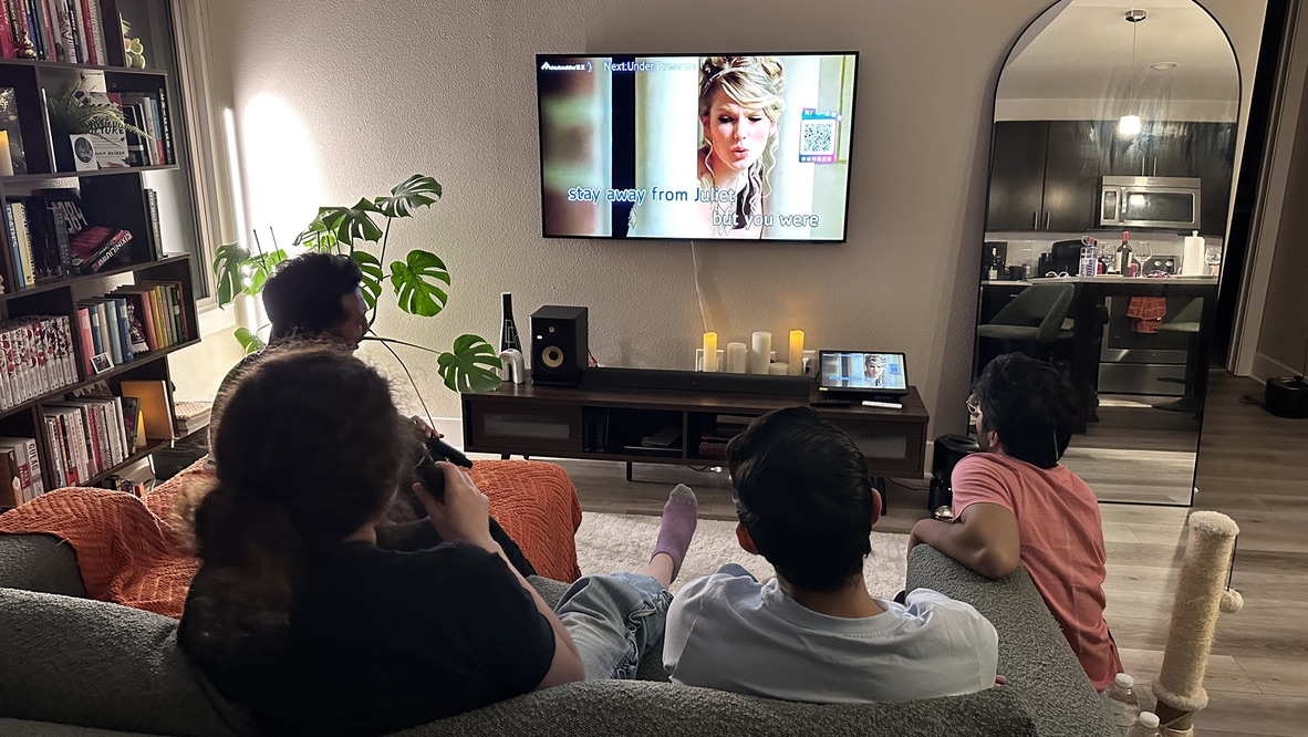 Neighbors enjoying a movie and karaoke night