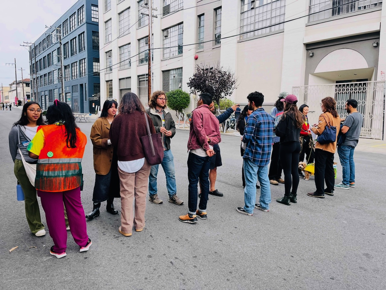 Neighbors chatting outside during a speed neighboring event